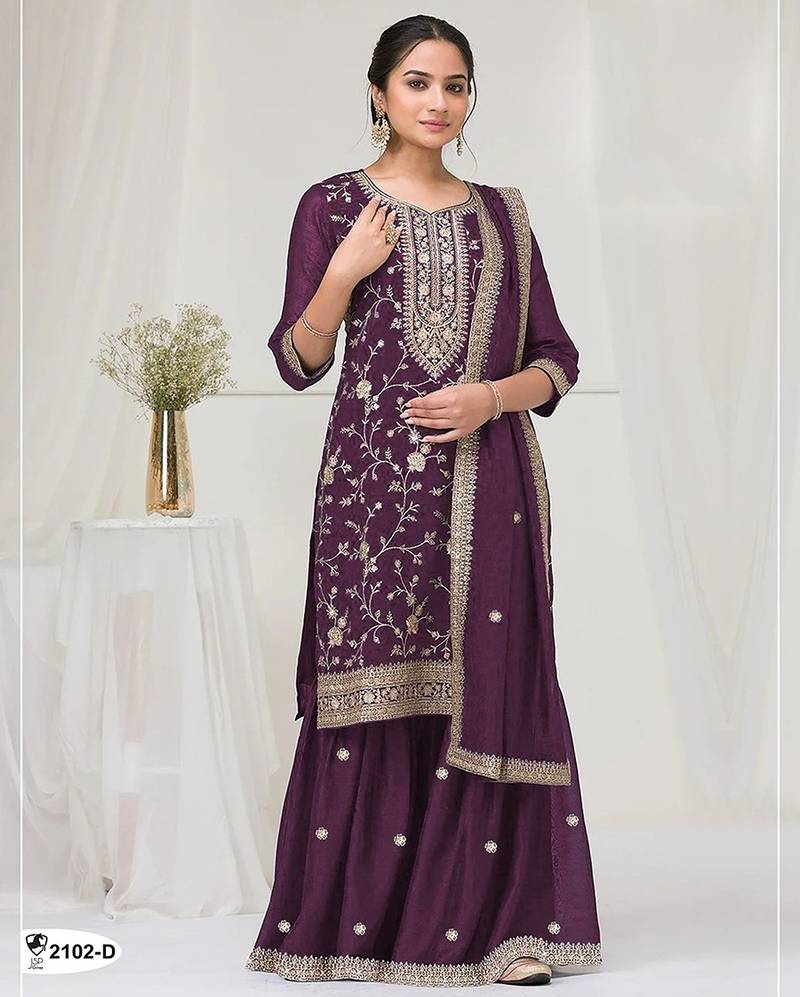 Deep purple fancy fabric hand embroidery semi stitched salwar suits