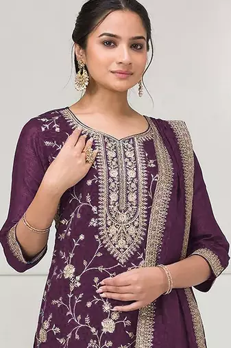 Deep purple fancy fabric hand embroidery semi stitched salwar suits