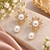 Certified natural freshwater pearls jewellery pearl drop earrings with cz floral stud, gold tone