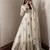 Cream silk blend embroidered flared gown set