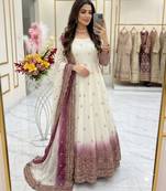 White georgette embroidered flared gown set