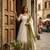 White georgette embroidered flared gown set