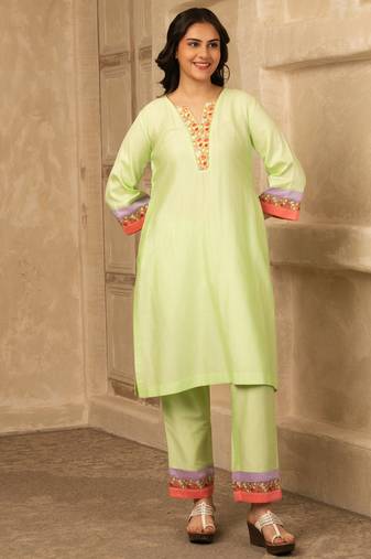 Green cotton kurta set with floral embroidery lace detailings