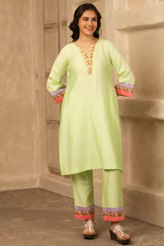 Green cotton kurta set with floral embroidery lace detailings