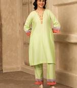 Green cotton kurta set with floral embroidery lace detailings