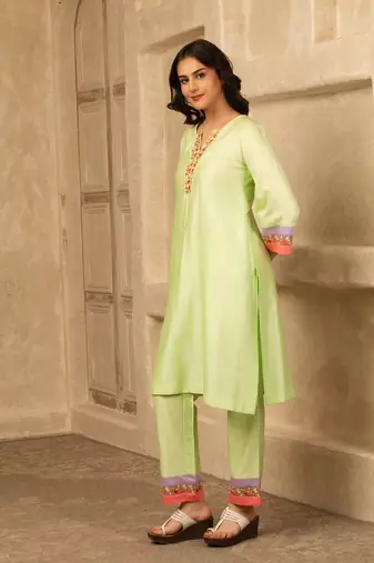 Green cotton kurta set with floral embroidery lace detailings