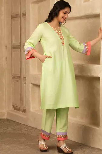 Green cotton kurta set with floral embroidery lace detailings