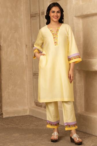 Yellow cotton kurta set with floral embroidery lace detailings