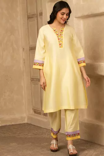 Yellow cotton kurta set with floral embroidery lace detailings