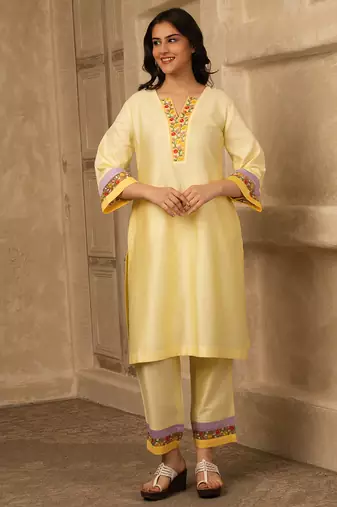 Yellow cotton kurta set with floral embroidery lace detailings