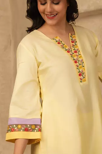 Yellow cotton kurta set with floral embroidery lace detailings