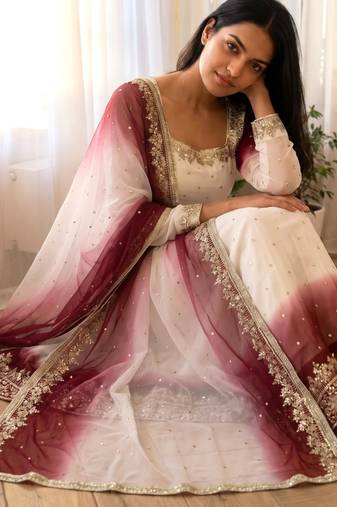 Off-white georgette embroidered flared gown set