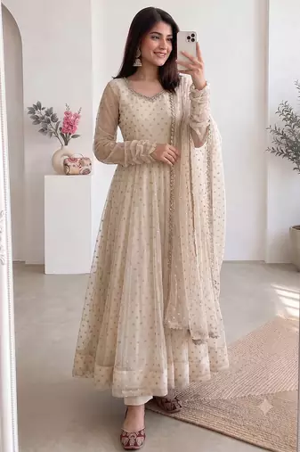 Women cream polka dot anarkali suit with solid trouser pant & border dupatta