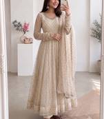 Women cream polka dot anarkali suit with solid trouser pant & border dupatta