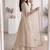 Women cream polka dot anarkali suit with solid trouser pant & border dupatta