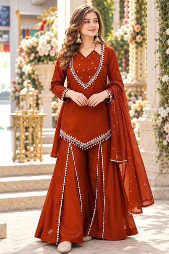 Rust silk blend readymade suit with miroor & moti work