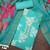 sea green unstitched thread embroidery handwork with digital printed dupatta silk blend dress material