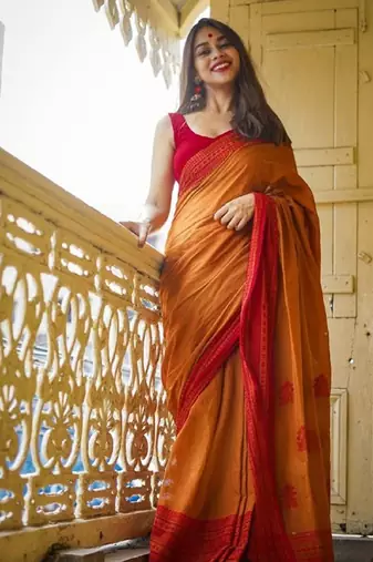 Yellow orange linen jacuard work festival saree with unstitched blouse piece