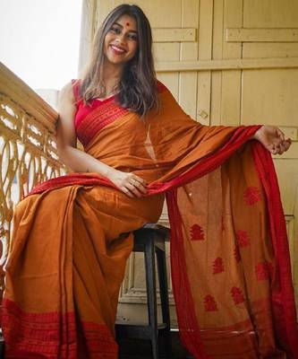 Yellow orange linen jacuard work festival saree with unstitched blouse piece 2
