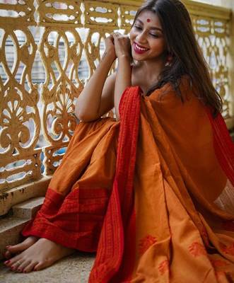 Yellow orange linen jacuard work festival saree with unstitched blouse piece 4