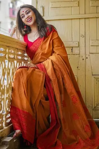 Yellow orange linen jacuard work festival saree with unstitched blouse piece