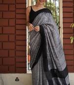 Grey black linen jacuard work festival saree with unstitched blouse piece