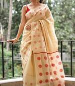 Cream red linen jacuard work festival saree with unstitched blouse piece