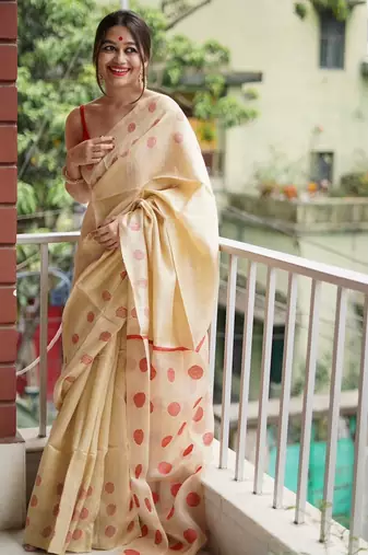 Cream red linen jacuard work festival saree with unstitched blouse piece