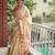 Cream red linen jacuard work festival saree with unstitched blouse piece