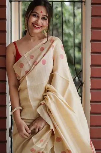 Cream red linen jacuard work festival saree with unstitched blouse piece