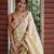 Cream red linen jacuard work festival saree with unstitched blouse piece
