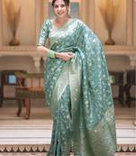 Sea green silk blend jacuard work festival saree with unstitched blouse piece