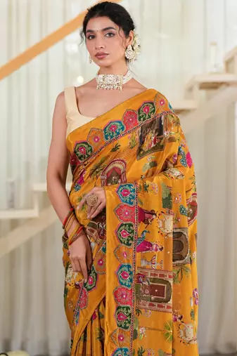 Sunehri- Mustard crepe saree with cutdana work hand embroidery