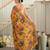 Sunehri- Mustard crepe saree with cutdana work hand embroidery