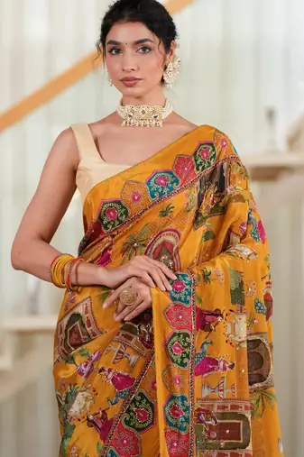 Sunehri- Mustard crepe saree with cutdana work hand embroidery