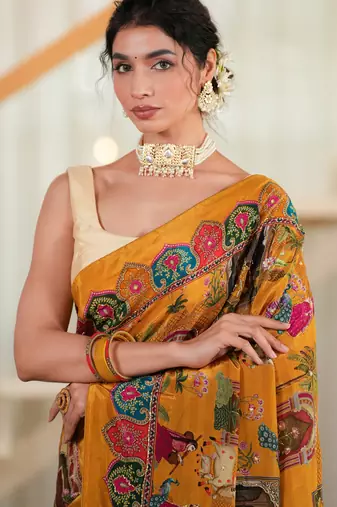 Sunehri- Mustard crepe saree with cutdana work hand embroidery