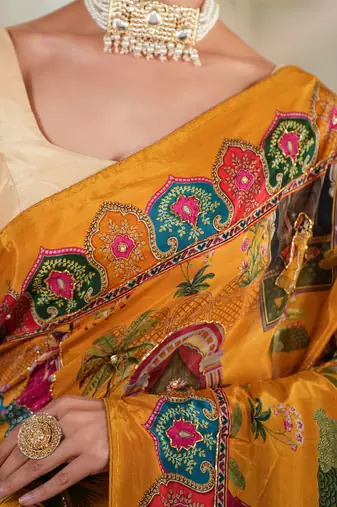 Sunehri- Mustard crepe saree with cutdana work hand embroidery