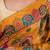 Sunehri- Mustard crepe saree with cutdana work hand embroidery