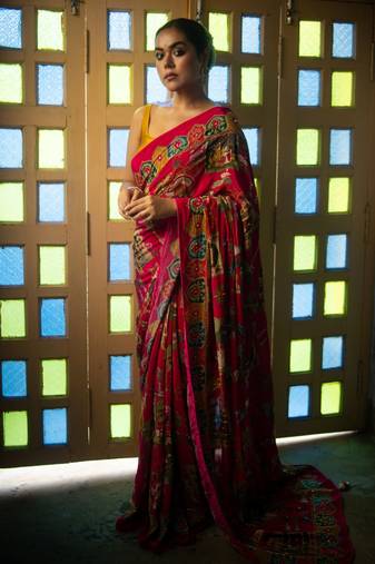 Madhavi- red crepe saree with cutdana work hand embroidery 