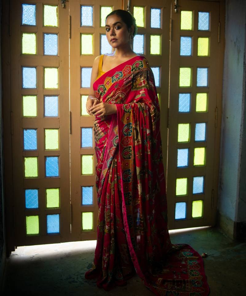 Madhavi- red crepe saree with cutdana work hand embroidery 