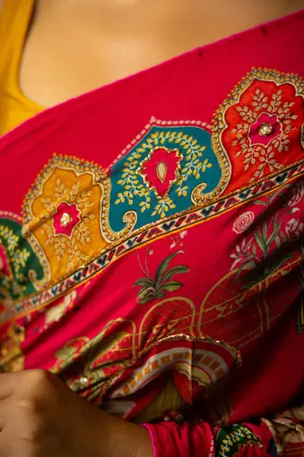 Madhavi- red crepe saree with cutdana work hand embroidery 