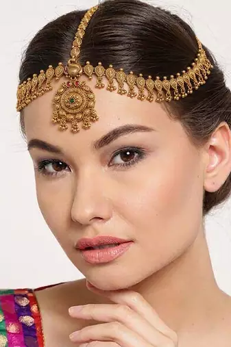 Women gold plated stone studded head jewellery
