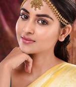 Women gold plated stone studded head jewellery
