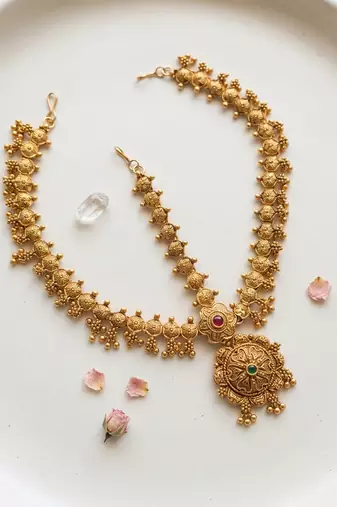 Women gold plated stone studded head jewellery