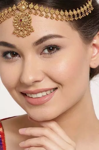 Women gold plated stone studded head jewellery