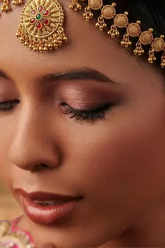 Women gold plated south indian stone studded head jewellery