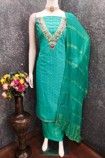 sea green unstitched weaving embroidered neck with woven embellished dupatta dress material