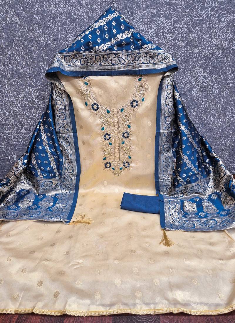 beige unstitched weaving embroidered neck with woven embellished dupatta shimmer butti dress material