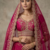 Rani Pink Color Crystal Beads,Diamond,Sequins And Handwork Motif Work Silk_Blend Lehenga Choli