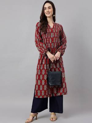 Women maroon pure cotton floral printed flared kurta 1